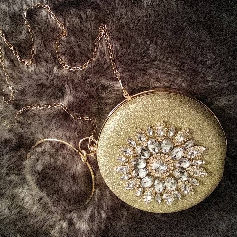 Gold evening clutch.